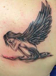 100 Angel Tattoo Ideas For Men And Women The Body Is A Canvas Tattoos Small Guardian Angel Tattoos Angel Tattoo Ideas