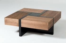 This coffee table with two generous storage drawers is a great way to corral items like toys, magazines, remotes and keep them out of sight, yet accessible. Lipscomb Coffee Table Has Four Hidden Drawers That Form Its Top