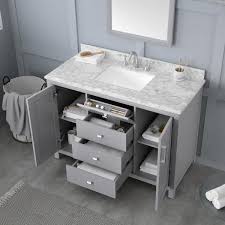 Style and the stain of the cabinets can set the tone to the entire room! Home Decorators Collection Rockleigh 48 In W X 22 In D Bath Vanity In Pebble Grey With Marble Vanity Top In Carrara White With White Basin Rockleigh 48pg The Home Depot