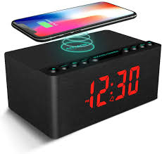 These nightstand charging stations solve at least half of that. Amazon Com Anjank Wooden Alarm Clock With Fm Radio 10w Super Fast Wireless Charger Station For Iphone Samsung 5 Level Dimmer Usb Charging Port Sleep Timer Digital Led Clock For Bedroom Electronics
