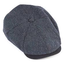 The most common peaky blinders hat material is glass. Flat Cap Newspaper Boy Hat Style Guide