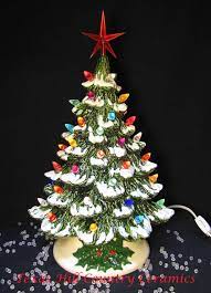The lightbulb inside illuminates the tiny colorful bulbs and casts a cheerful glow on tabletops, fireplace mantels, or any place that calls for a festive touch! Wishing For Falling Snow Ceramic Christmas Tree Ceramic Christmas Tree Lights Christmas Tree With Coloured Lights Vintage Ceramic Christmas Tree