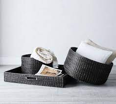 It's made from natural bamboo and is an ideal size for those tropical parties. Garrett Woven Storage Baskets Black Pottery Barn