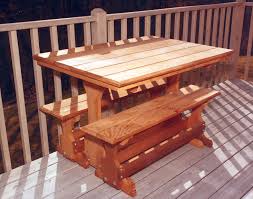 They are a convenient method of bringing chic city life to wild outdoor environments. Red Cedar Rectangular Trestle Picnic Table Set