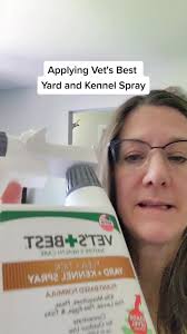Applying Vet's Best Yard and Kennel Spray for Flea Deterrent