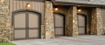 Faux finishing garage doors to look like wood. Horizontally Moving Garage Doors By Artisan Solido Designs