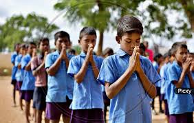 Image of Govt school students performing morning prayer at school .-ZF271641-Picxy