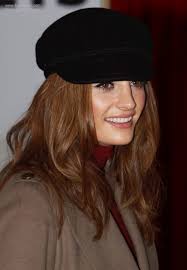 The hairstyles and looks of stana katic. Stana Katic With Long Hair And Wearing A Chauffeur Style Hat And Turtleneck