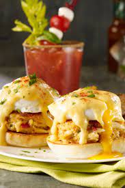 Two pan fried crab cakes, two poached eggs, grilled tomatoes and hollandaise sauce. Crab Cake Eggs Benedict Breakfast Brunch Recipes Sunday Brunch Food Brunch Recipes