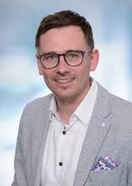 Accelerated radiation tolerance testing of Ti-based MAX phases