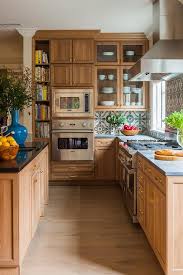 Concrete is a composite material composed of fine and coarse aggregate bonded together with a fluid cement (cement paste) that hardens (cures) over time. Caramel Stained Kitchen Cabinets With Concrete Countertops Transitional Kitchen