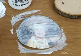 Mod podge can act as both a glue and a sealer. Easy Photo Transfer On Wood Slices With Mod Podge Sue S Creative Workshop