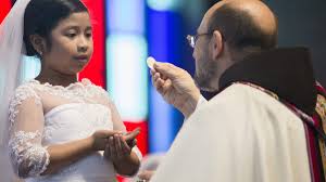 First Holy Communion, the beginning of a lifelong journey with Christ-  Catholic Standard
