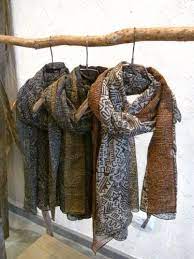 Stylize The Scarves On A Hanger To Show Shopper How It Will Look On Visual Merchandising Retail Store Display Scarf Display Retail Display Boutique Display