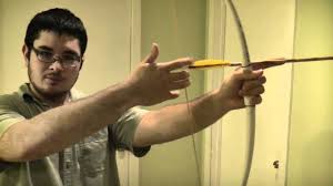 Is the arrow on the wrong side of the bow? How To Hold A Bow With No Arrow Rest Youtube