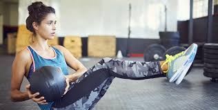 Sit down on the ground with your knees bent, heels firmly planted and your back about 45 degrees from the ground (a basic beginning sit up position). 6 Medicine Ball Exercises For Abs Butt Shoulders And Arms