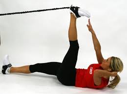 Lie on your back holding a dumbbell, and lift your legs until they're perpendicular to the floor. Exercise Of The Week Alternating Toe Touch Toe Touches Happy Boxing Day Exercise
