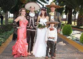A Family Dressed In Traditional Charro Clothing Celebrating A Wedding In Jalisco Mexico Charro Wedding Wedding Dresses Wedding Attire