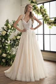 Halters have a loop top that wraps around the neck, and they are very flattering on women with long necks. T202008 Illusion Bodice V Neck Lace Bridal Gown Wedding Dress With Halter Straps