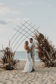 See more ideas about arbor, flowers, wedding arch. Epic Sculptural Arch For This Beach Micro Wedding In Queensland