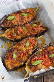 Melanzane ripiene al forno, come le faceva la mamma. Melanzane A Barchetta Ripiene Con Prosciutto Secondo Piatto Al Forno Ricette Melanzane Ricette Facili