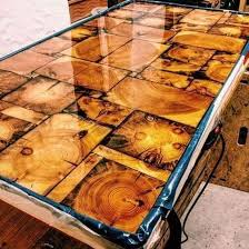 Look at this miniature pallet coffee table that is made of separated pallet slats, and it is having base painted in white while the top planks come in different tons of wood! Amazing End Grain Resin Tabletop Wood Table Design Amazing Resin Resin Furniture