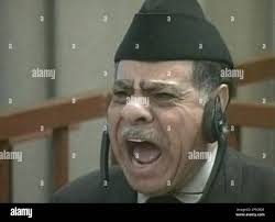 Former Baath party official Abdul-Ghani Abdul-Ghafur in Baghdad, Iraq,  Tuesday, Dec. 2, 2008, reacts after he received the death sentence at the  end of his trial, convicting him of crimes against humanity