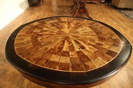 Can support up to 300 lbs. Jupe Table 45 Inch To 56inch Round To Round Dining Table