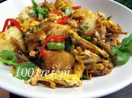 Nasi impit is rice cake, usually eaten with gravy like rendang (spicy meat dish), kuah kacang (peanut sauce) or kuah lodeh (vegetables cooked in coconut milk). Resepi Nasi Impit Goreng Chinese Style