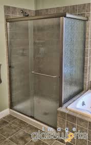Elegant Semi Frameless Shower Slider With Rain Glass And Brushed Nickel Hardware Rain Glass Shower Door Glass Shower Doors Shower Doors