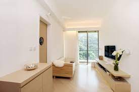 Apartment At Aria The Classic White Wall Creates A Minimalistic Backdrop For The Light Oak Wood Furniture And Floo Interior Design Diy Floating Cabinets Home