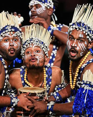 Members of the Gujarati Siddi tribe perform during a 'Siddi Dhamal' performance at Lok Rang 2025, in Jaipur