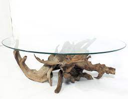 Driftwood base coffee table with freeform glass top. Sculptural Driftwood Coffee Table At 1stdibs