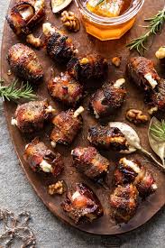 Goat Cheese Stuffed Bacon Wrapped Dates With Rosemary Honey Half Baked Harvest Recipe Bacon Wrapped Dates Appetizer Recipes Appetizer Bites