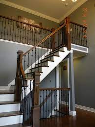 Wood Stairs And Rails And Iron Balusters Indoor Stair Railing Hardwood Stairs Staircase Remodel
