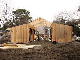 Simple horse barns provide protection from the sun, wind, rain or snow and just enough space for the barn should be sturdy enough to stand up to the weather and the horses. Horse Barn Ideas Stables Horse Barn Plans Horse Barn Designs