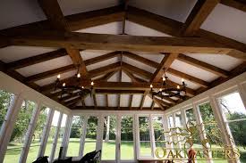 Timber Framed Ceiling Beautiful Oak Trusses And Rafters Used To Enhance This Sun Room Roof Architecture Orangery Roof Trusses