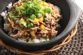 2 chicken breasts, still frozen 1 can rotel tomatoes 1 can corn kernels, do not drain 1 can black beans, drained and rinsed 1 pkg. Crock Pot Santa Fe Chicken