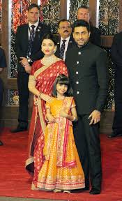 The bachchans pose for a photo with granddaughter. Bollywood Celebrities Serve Food To Guests At Ambani S Daughter Wedding Global Village Space