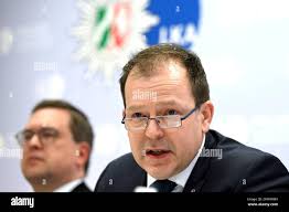 Dirk Kunze, right, Head of Department 42 at the North Rhine-Westphalia  State Criminal Police Office, and Markus Hartmann, Head of the North  Rhine-Westphalia Cybercrime Central and Contact Point, answer questions  during a