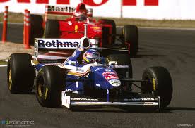 The model is around 10 cm long and comes mounted on a black display stand with a hard perspex cover. 1997 Japanese Grand Prix Schumacher Wins Villeneuve Dq F1 Fanatic