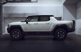 The hummer ev is festooned with hummer badges and h patterns, but you'll also notice a couple of gmc tags, too—done up in black rather than the brand's traditional red. Gmc Hummer Ev Pickup Detailed In New Clip Video