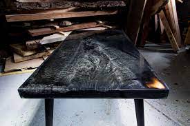 Give your home a cool fire pit table with this brick façade propane patio fire pit. Fire Epoxy Table Blacktail Studio