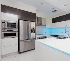 The presence of permanent heating nearby leads to a rapid failure of the refrigerator. Refrigerator Next To Stove In Kitchen Designing Idea