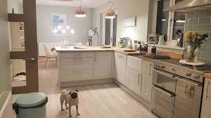 Brand new luxury laminate grey marble effect worktop and breakfast bar wren kitchens. Shaker Kitchen In Fossil Grey Grey Shaker Kitchen Shaker Kitchen Grey Cabinets