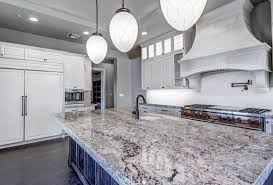 Find out the best types of while natural stone options, like granite countertops, are a great choice for the home, there are with its dark grey tones, you can contrast white cabinetry without selecting brown or black quartz. White Kitchen Cabinets With Granite Countertops Designing Idea