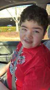 Admiration for a strong kid in the gym