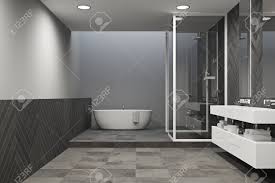 This corner bathroom double sink vanity graphic has 12 dominated colors, which include silver, tin, uniform grey, camel hide, sunny pavement, snowflake, olive court, white, worn wooden, sefid white, karry, rusty nail. Interior Of A Gray Bathroom With A Tied Floor A White Tub And Stock Photo Picture And Royalty Free Image Image 95655478