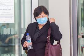 Phoon chiu yoke, 53, seen leaving the state courts without her mask on 24 may 2021. Not Possible To Have Fair Hearing Woman Without Mask At Mbs