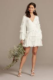 She wears a white long sleeved floral print dress with a pale green sleeveless dress over the. Graduation Dresses In White Colors High School College David S Bridal